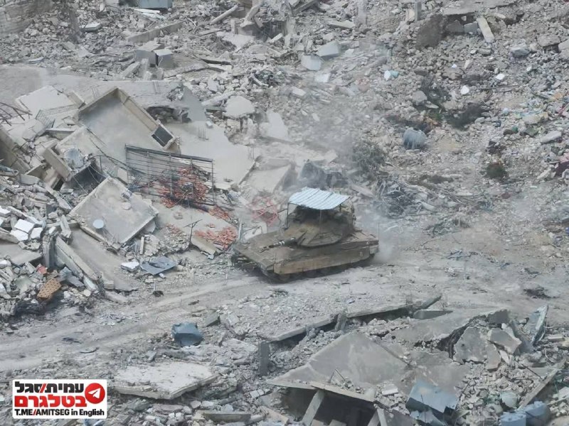 Израильские танки в разрушенном Бинт-Джбейле